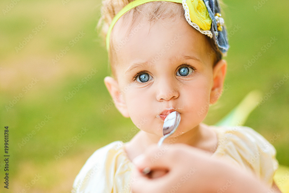 small blue eyed girl eats play outside small blue eyed girl eats play outside