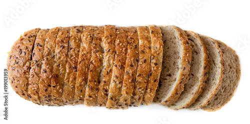Fototapeta Top view of sliced wholegrain loaf  bread  isolated on white background closeup