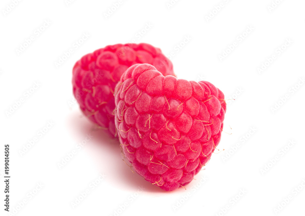 Fresh Red Raspberries Isolated on a White Background Fresh Red Raspberries Isolated on a White Background