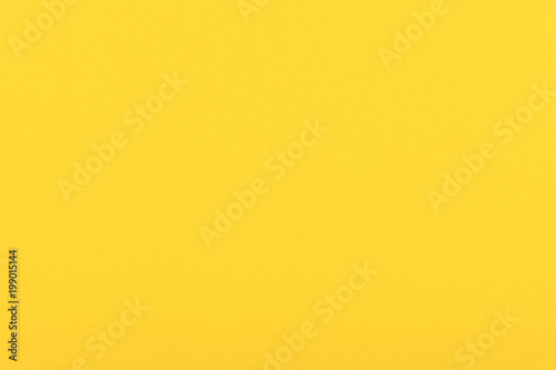 Bright yellow velvet paper texture background 