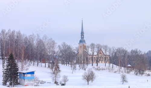 Otepaa St Mary s Lutheran Church at Winter. Snow castle in Estonia mountains. Blue beautiful background of Estonia frozen holiday ice.