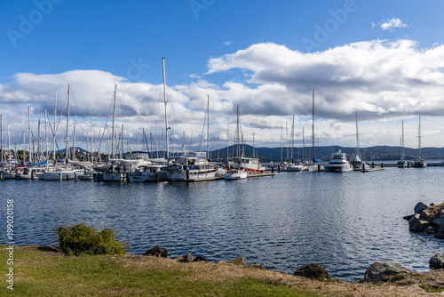 Scenic view of a yacht port. Wrest point marina, Hobart, Australia, cloudy sky in background. © AVPHOTOSALES