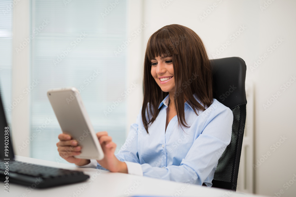 Portrait of a woman using a tablet Portrait of a woman using a tablet