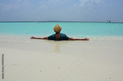 Freedom and relax on a tropical white sand beach © Jan