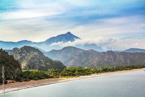 Top view of Chirali beach in Turkey and Tahtali Dag mountain photo