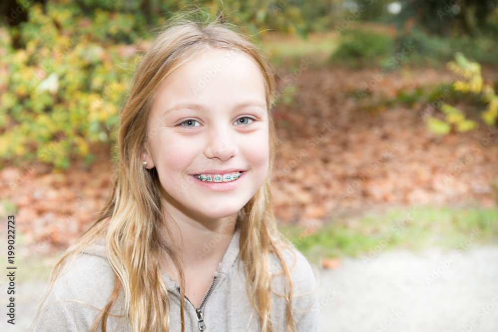 braces teeth teenager girl outdoor smiling beauty cute teen girls Stock  Photo | Adobe Stock