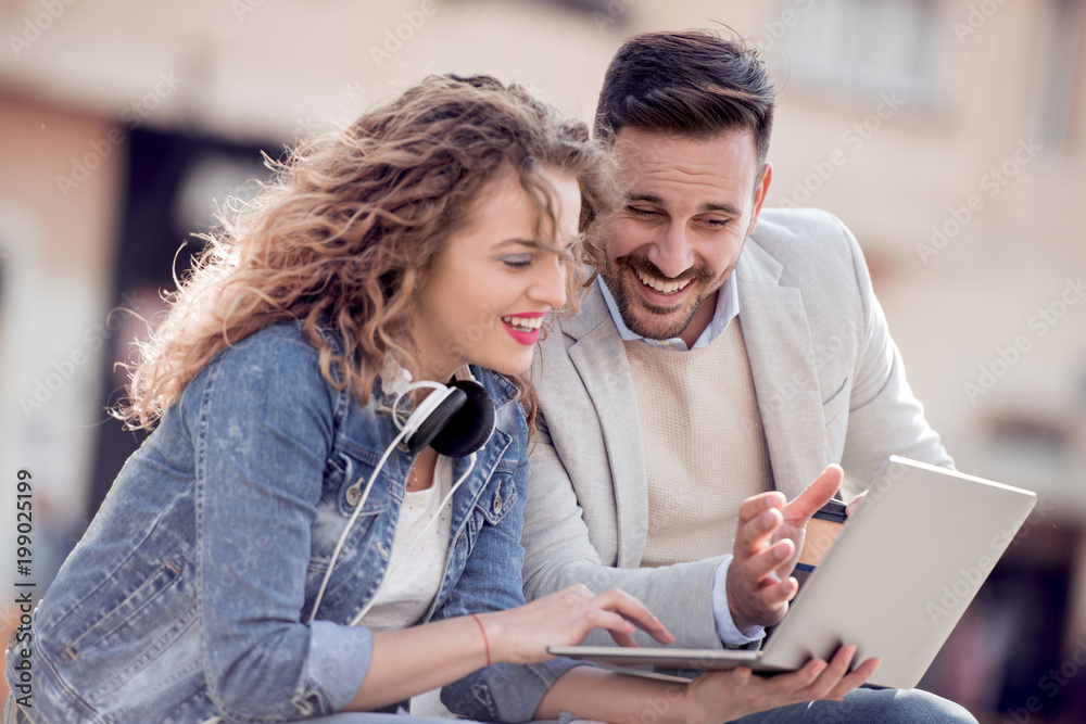 Happy young couple with laptop Happy young couple with laptop