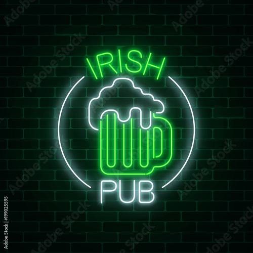 Glowing neon irish pub signboard in circle frame with text on dark brick wall background.