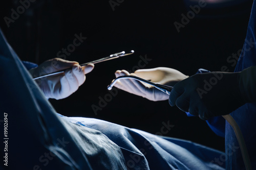 motion hand group of Doctor and Assistant surgeons work for rescue patient in operation room at hospital, emergency case, surgery, medical technology, health care cancer, disease treatment concept