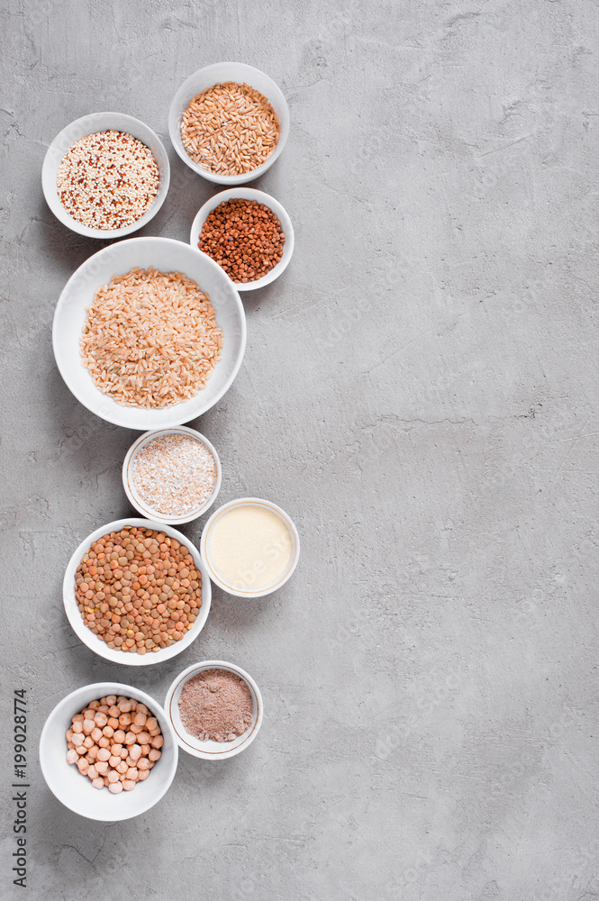 Background with various cereals and beans in white plates Background with various cereals and beans in white plates