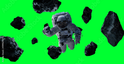 Fototapeta Naklejka Na Ścianę i Meble -  Astronaut isolated on green background 3D rendering elements of this image furnished by NASA