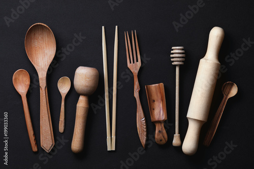 Various wooden kitchen utensils photographed from above, close-up