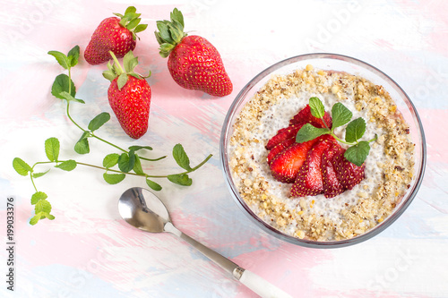Chia pudding with coconut milk, strawberries and peanuts