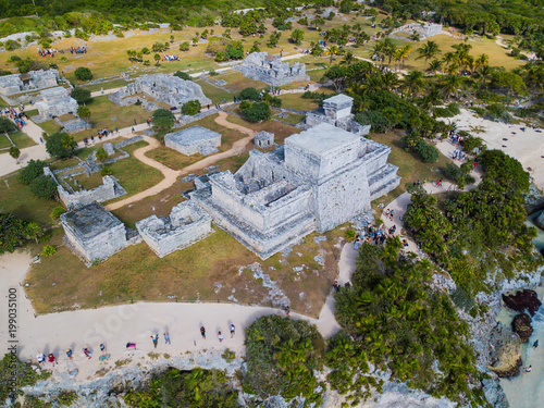 Ruins of Tulum, Mexico overlooking the Caribbean Sea in the Riviera Maya Aerial View. Tulum beach Quintana Roo Mexico - drone shot. White sand beach and ruins of Tulum.