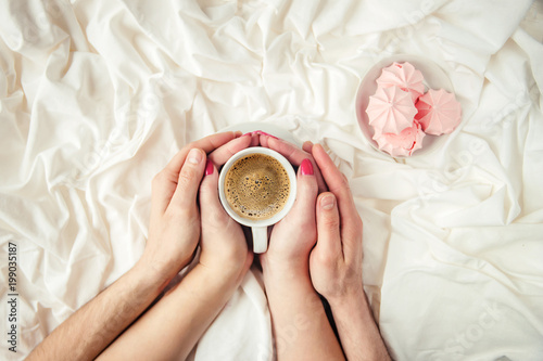 Coffee in bed. Selective focus.  photo