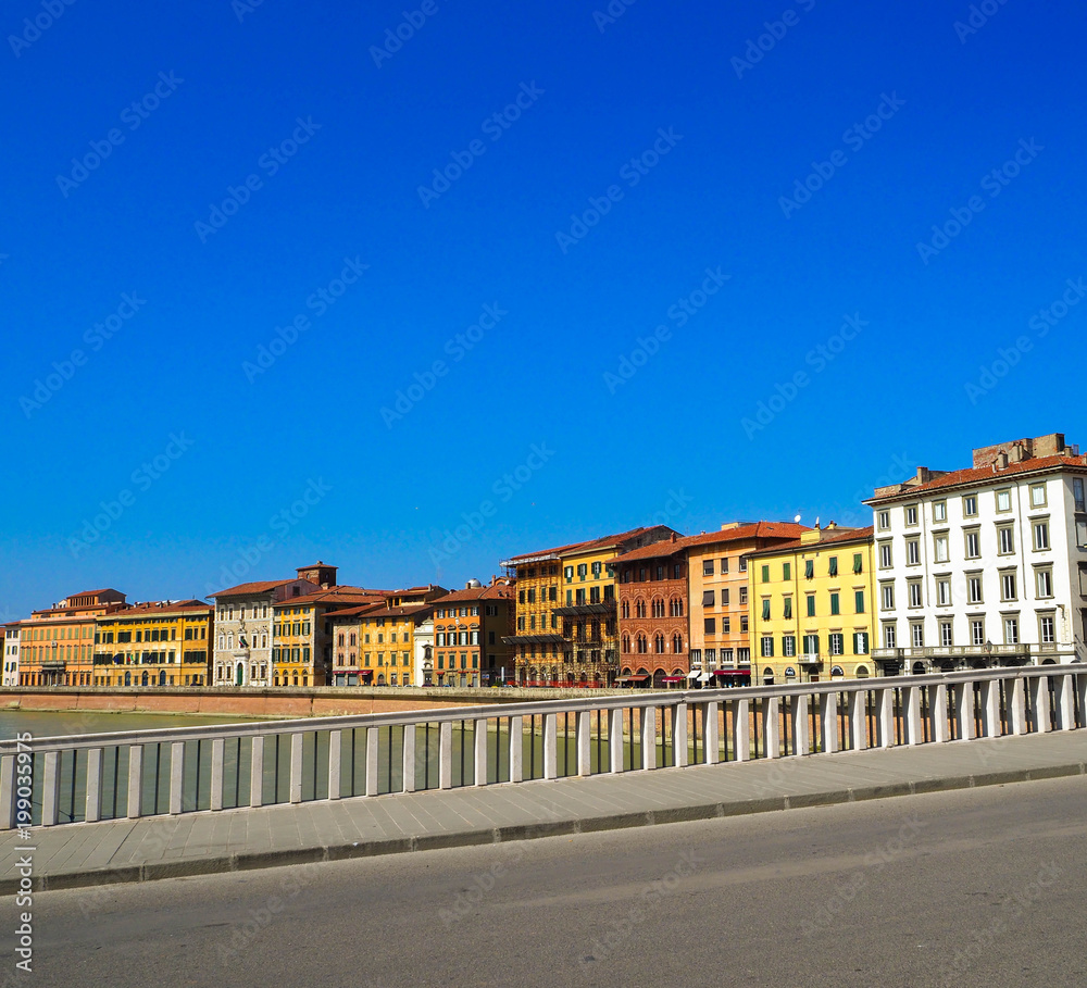 view of the bridge and river in the city on the old buildings