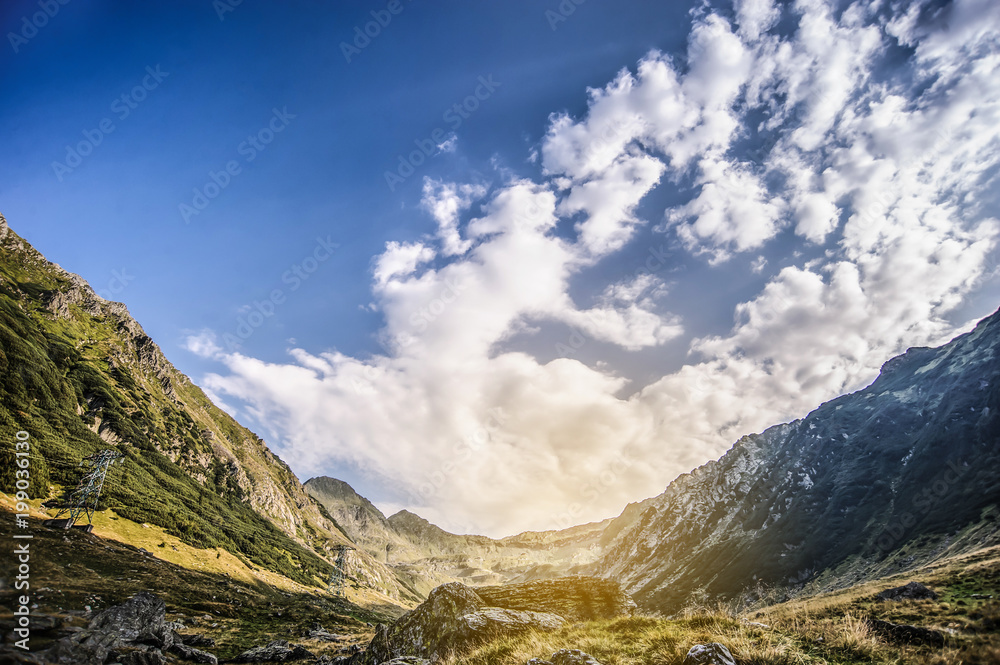 Obraz premium Foot mountain view on sunset