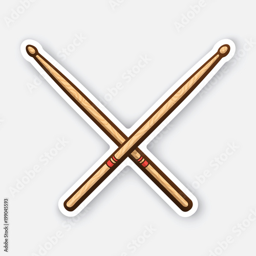 Sticker of crossed wooden drumsticks photo