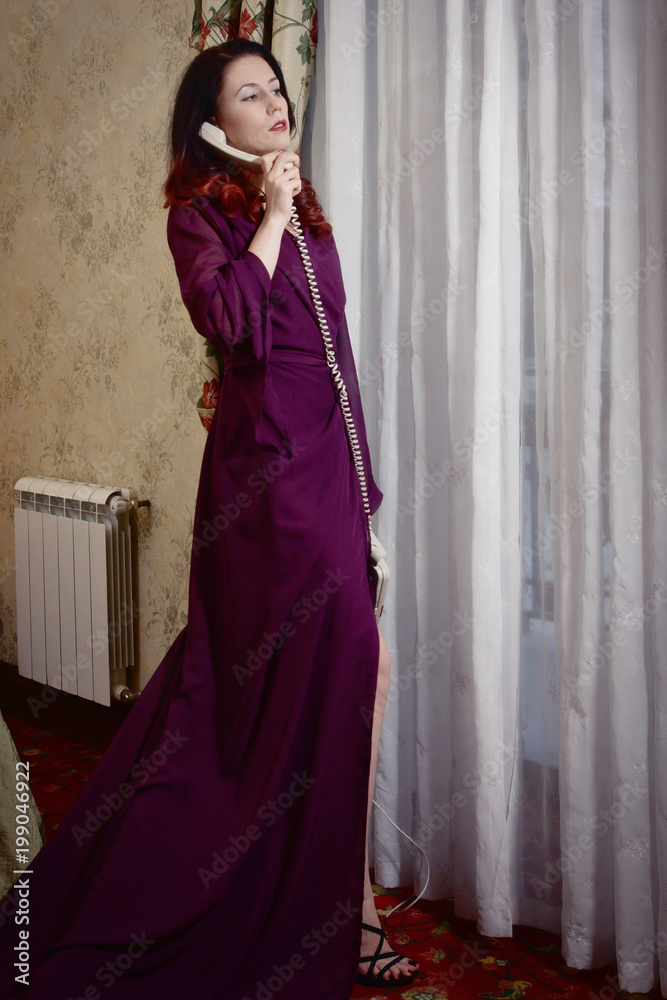Beautiful woman speaks by phone Beautiful woman speaks by phone