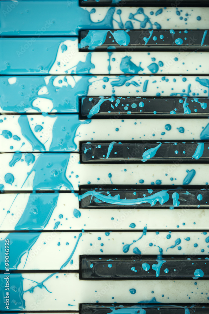 Piano keayboard in blue paint stain, keyboard. Piano keayboard in blue paint stain, keyboard.