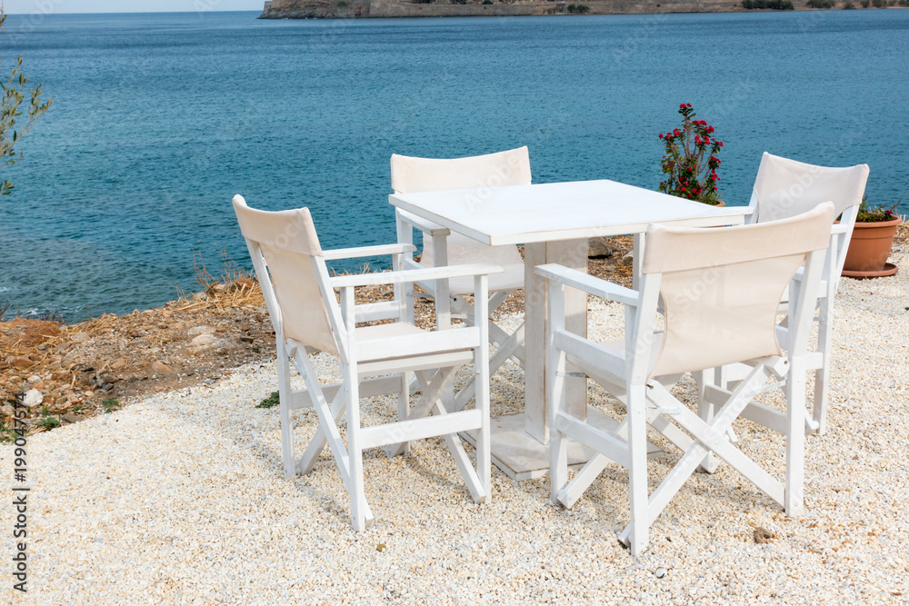 Sea facing restaurant tables and chairs