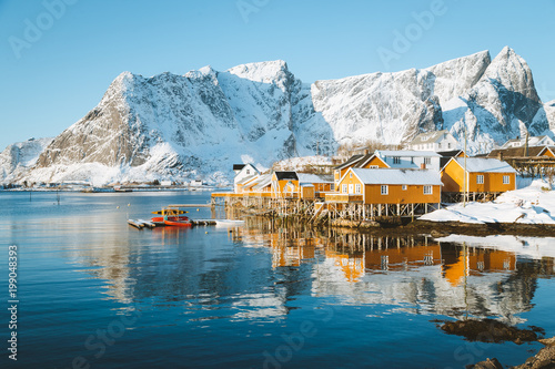 Lofoten Islands winter scenery with traditional fisherman Rorbuer cabins, Sakrisoy, village of Reine, Norway photo