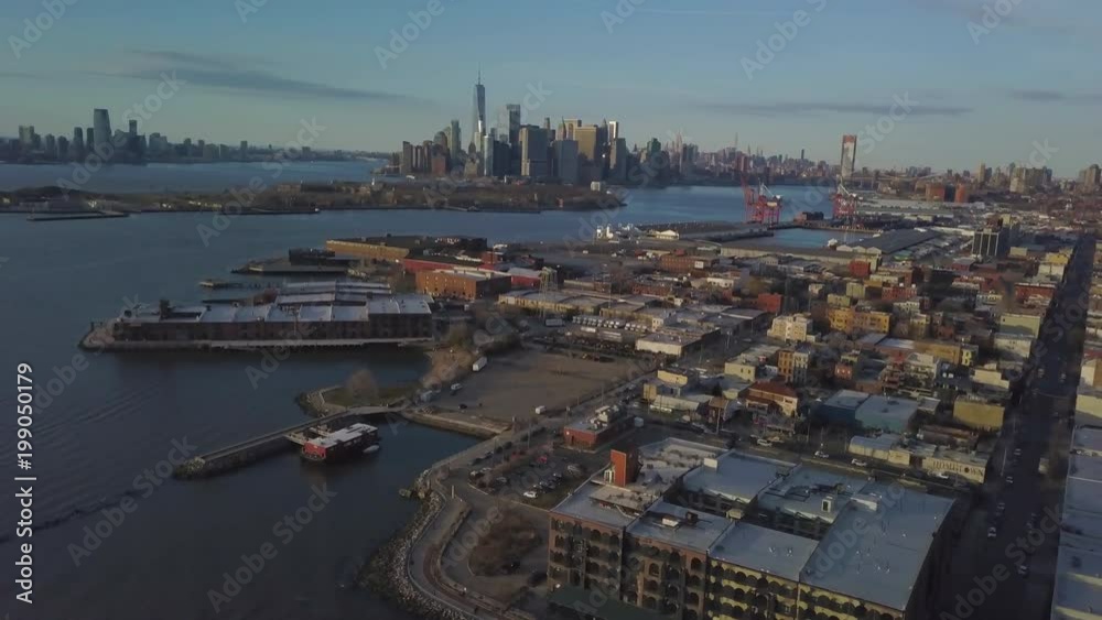 day flying slowly over Red Hook waterfront towards Manhattan skyline day flying slowly over Red Hook waterfront towards Manhattan skyline