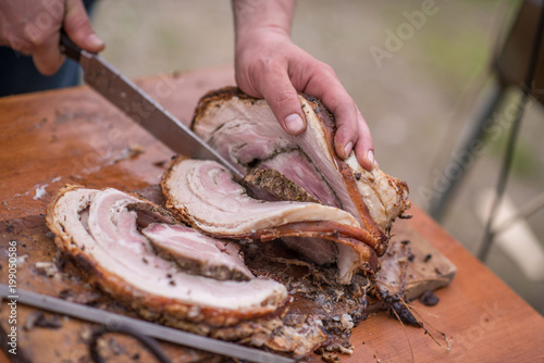 Taglio della porchetta photo