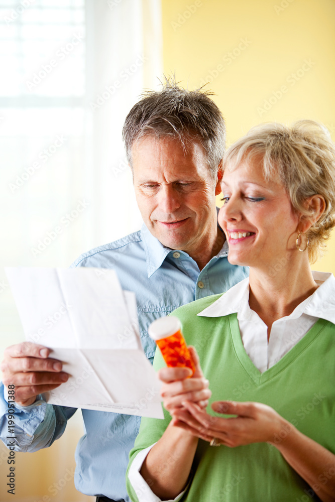 Couple: Man and Woman Dealing with Medication Couple: Man and Woman Dealing with Medication