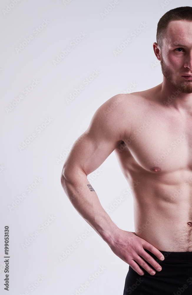 cropped studio shot of strong man