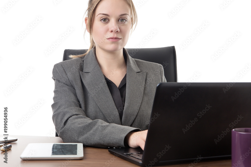young business woman sitting a her desk young business woman sitting a her desk