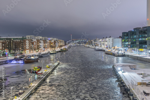 Norra Hammarbykajen med flertal båter förtöjda under hela året fotat från Skansbron photo