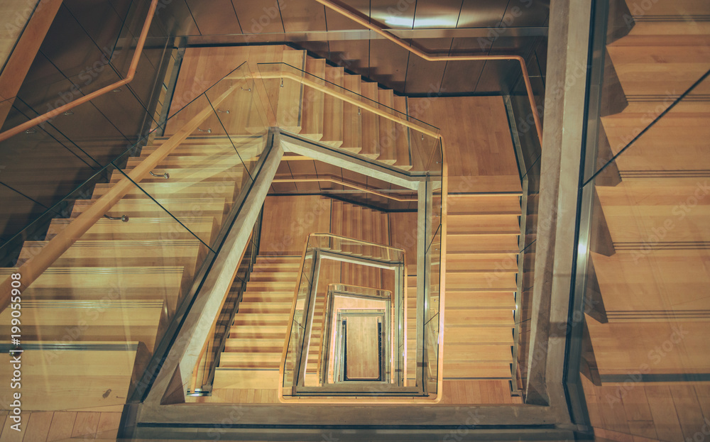 Falling the air swirls with ash cobbled stairs spiral downwards
