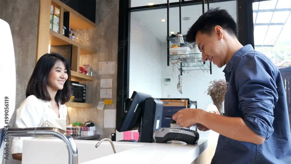Asian people using smartphone for buy coffee. Asian people using smartphone for buy coffee.