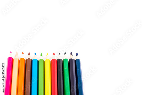 stationary colored pencil on white background
