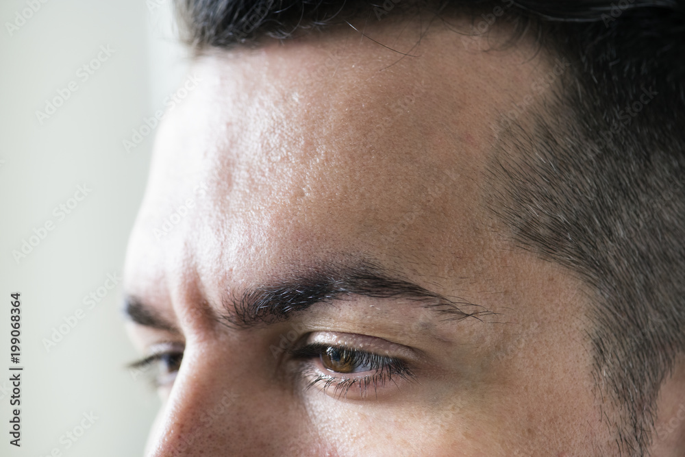 Side portrait of white man closeup on eyes