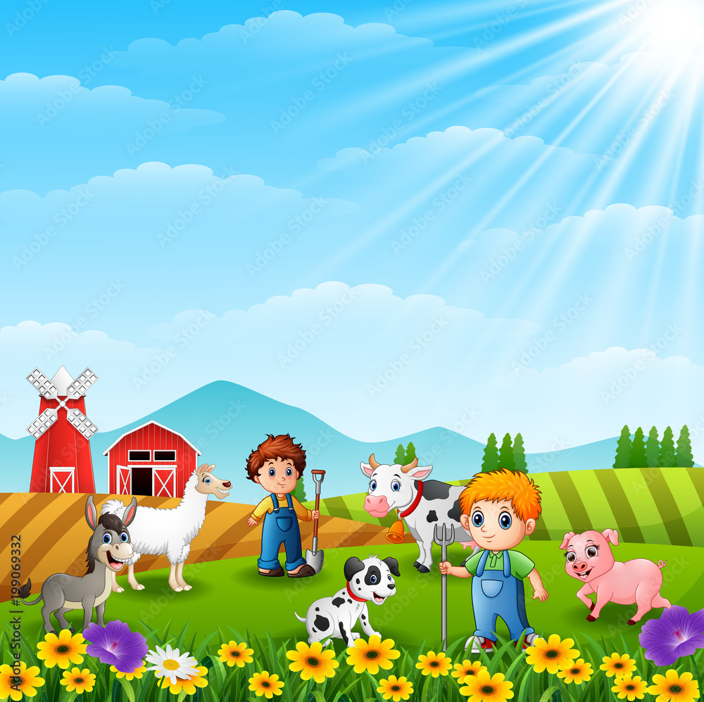 The young farmers in the farm with the animals The young farmers in the farm with the animals