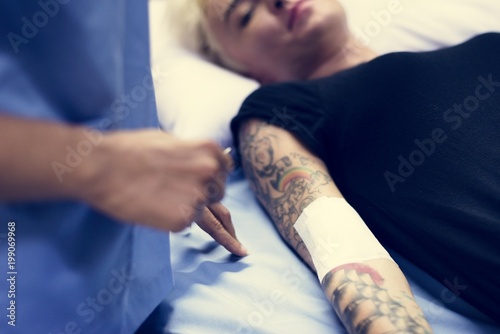 Woman lying on a hospital bed