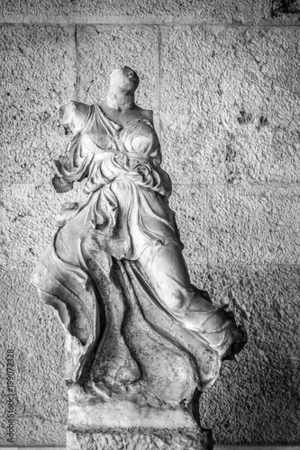 Broken statue of woman, Athens, Greece