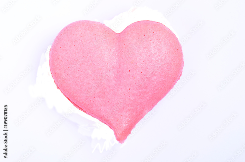 Heart shape macaron a white background