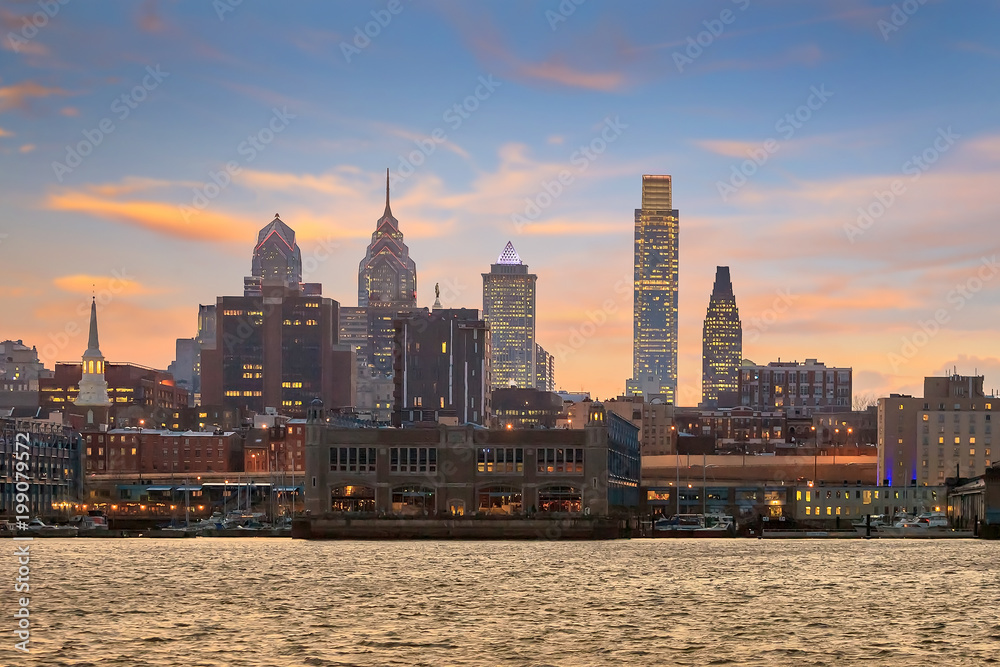 Philadelphia skyline and penn's landing at twilight