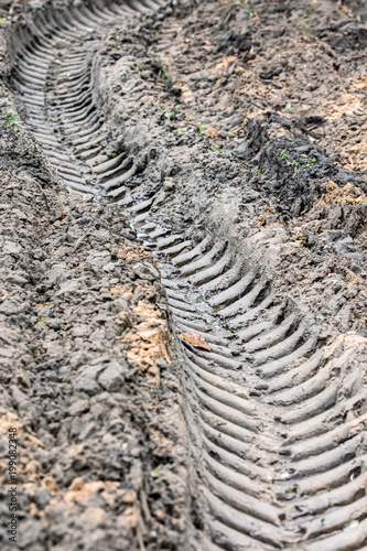 vehicle tire tracks in the muddy wet ground closeup © Mr Twister