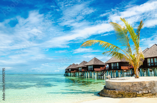 Fototapeta Naklejka Na Ścianę i Meble -  Exotic wooden huts on the water, Maldives