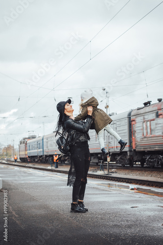 Mother and daughter at the train station © keleny