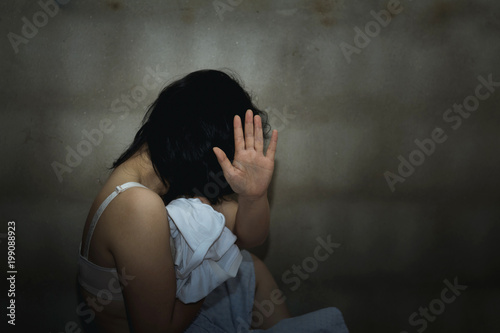 Violence and rape concept,concept photo of sexual assault,traumatized woman photo