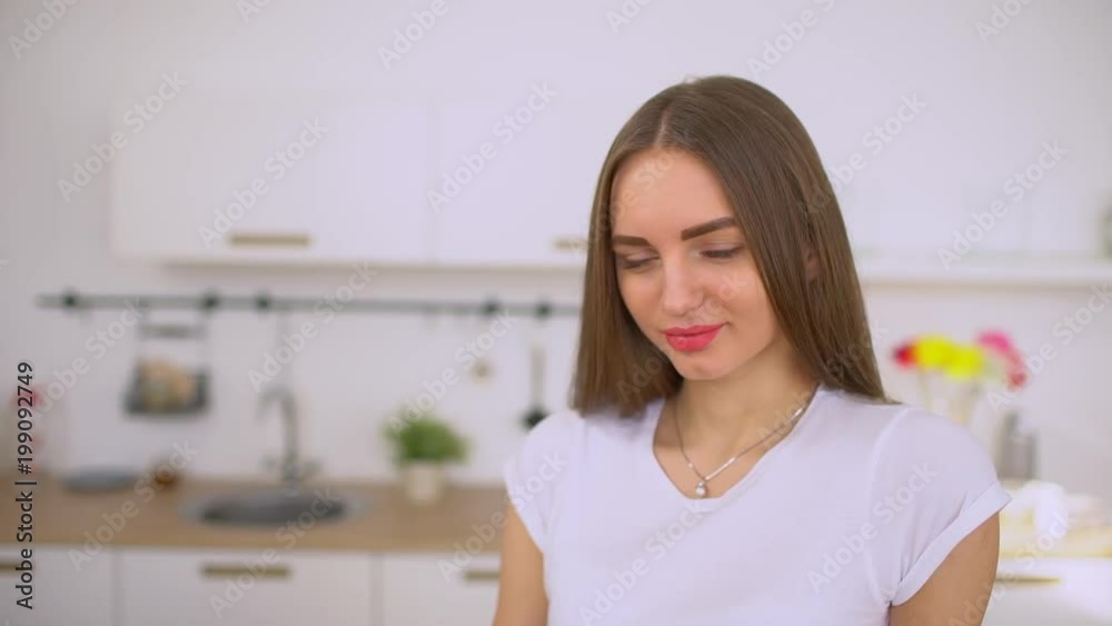 Woman drinking fresh carrot juice. slow-motion Woman drinking fresh carrot juice. slow-motion