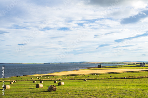 Amazing seascape with hay bales in the far north of Scotland near Wick, Caithness, Scotland, Britain