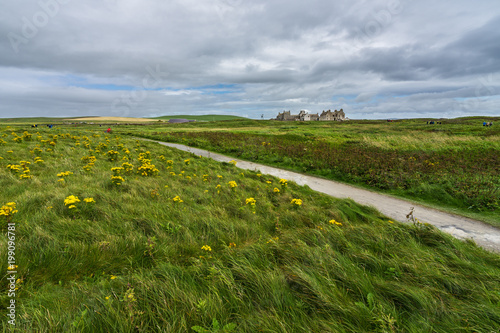 Orkney magnificent landscape near Skara Brae Neolithic settlement with Skaill House on the foreground, Scotland, Britain photo