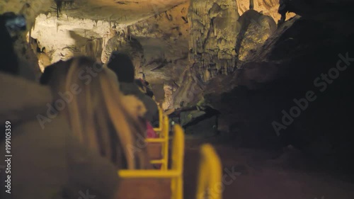 postojna slovenia 01/01/2018: train ride into postojna caves interior photo