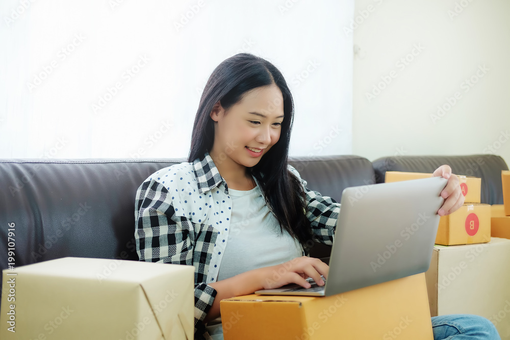 freedom work concept, Business woman entrepreneur, working online shopping and using laptop computer at her home. freedom work concept, Business woman entrepreneur, working online shopping and using laptop computer at her home.